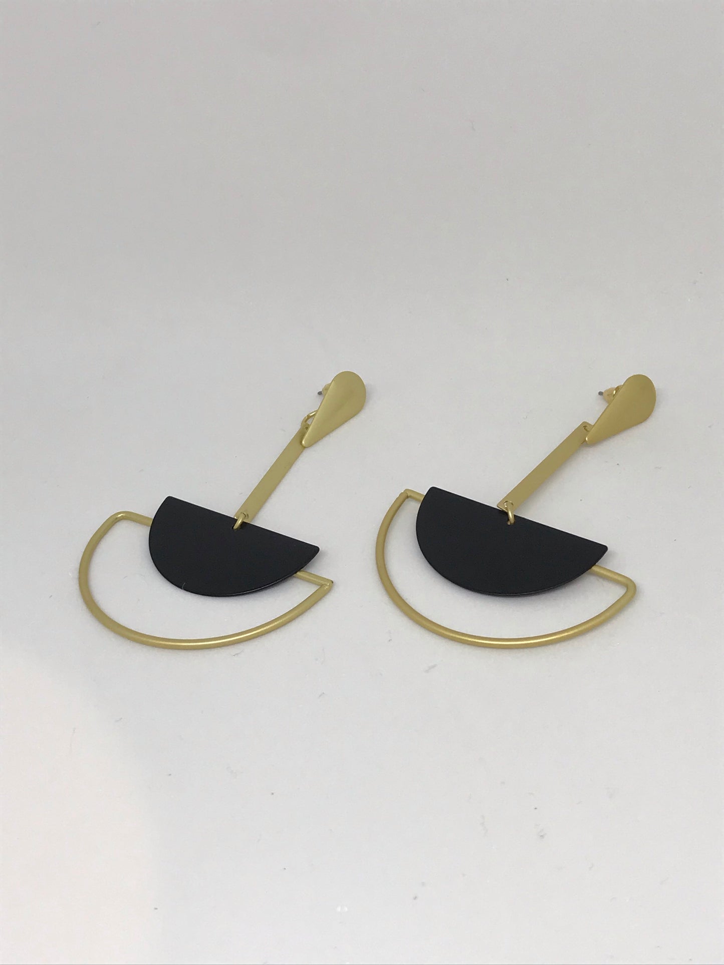 BLACK AND GOLD SEMI-CIRCLE STUDS